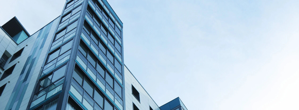 Low Angle View of Office Building Against Sky